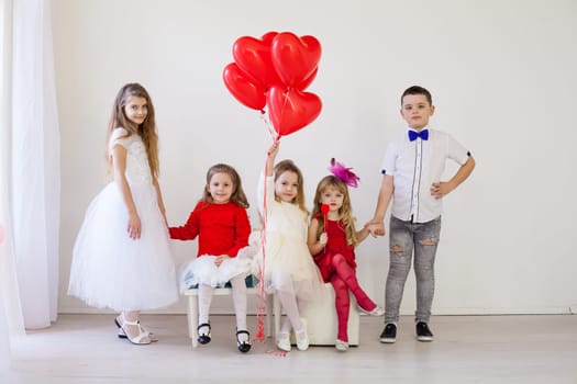 Kids red balloons in the interior of the room