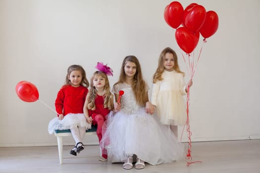 Kids red balloons in the interior of the room