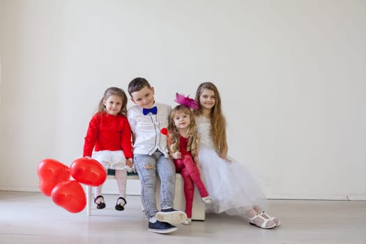 Kids red balloons in the interior of the room