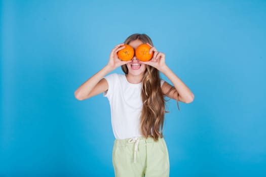 the girl closed her eyes with oranges