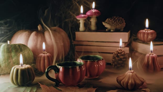 Cute cups of tea among pumpkin candles. Autumn-themed content, cafe promotions or visual storytelling that exudes comfort. Touch of intimacy, tranquil and inviting atmosphere.