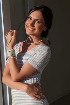 Portrait of a brunette woman in a dress