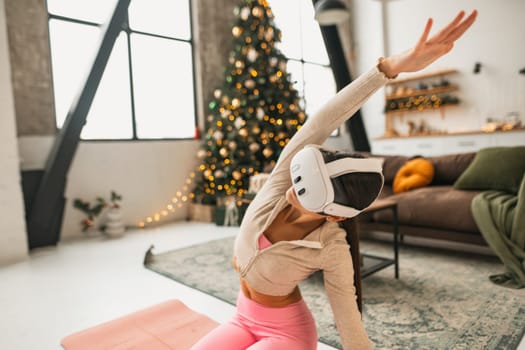 Hosting online workout classes at home with a virtual reality headset during the Christmas holiday season. High quality photo