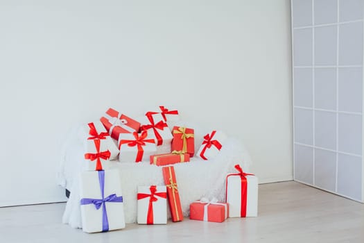 white sofa with gifts for Christmas birthday party