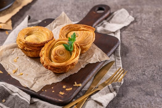 Pastries filled with meat, traditionally baked in black clay molds both from the region on Vila Real, Portugal.