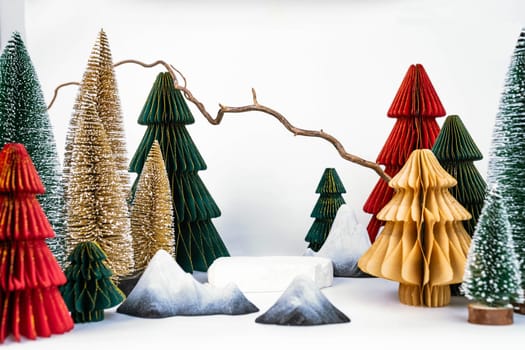 New Year's concept, product stand. Colored Christmas trees. High quality photo