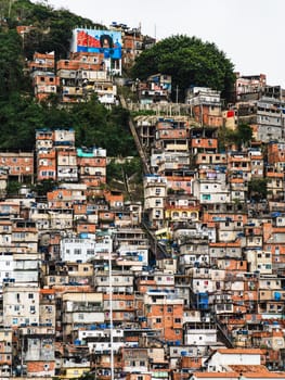Densely populated Rio favela exhibits resilience on very steep hillside.
