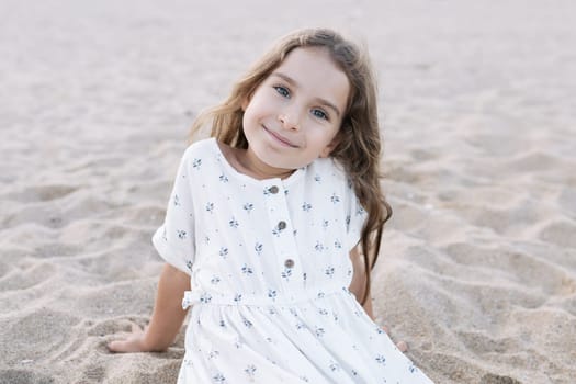 Little girl enjoying summer vacation at the sea.