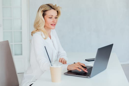 woman at computer in office at work