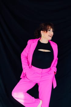 Portrait of a young woman in a purple business suit