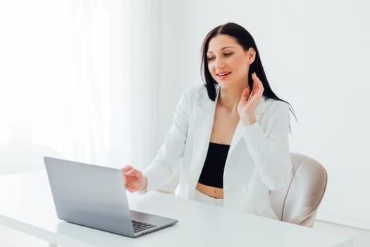 woman in business suit online working on the internet