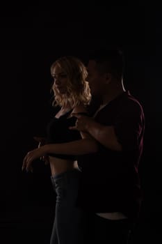 Man and woman dancing to music