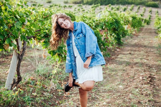 woman in vineyard garden harvesting