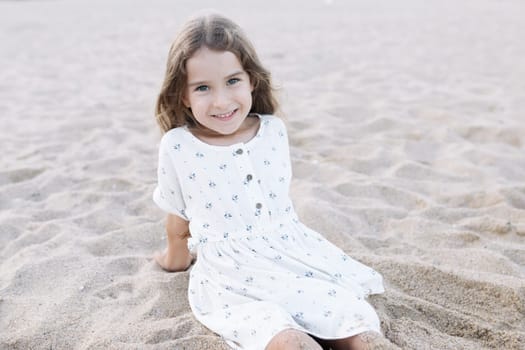 Little girl enjoying summer vacation at the sea.