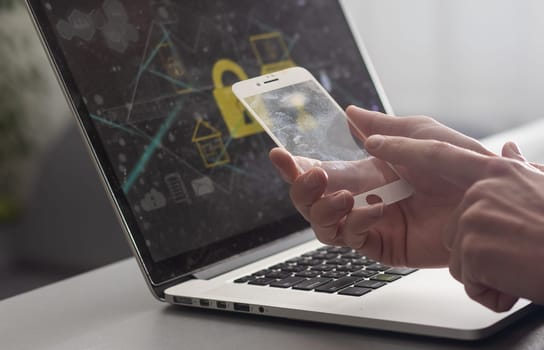 business, statistics, people and future technology concept - close up of businessman hand with charts on transparent smartphone screen and virtual projections over black background