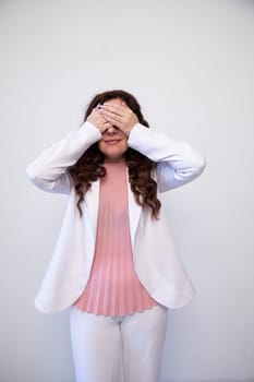 Beautiful brunette woman tearing paper at table negative emotions