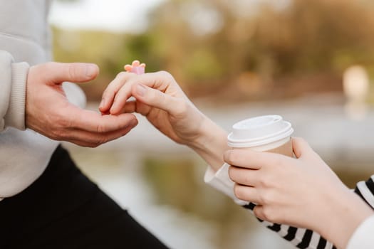 woman and man holding hands. Shallow dof