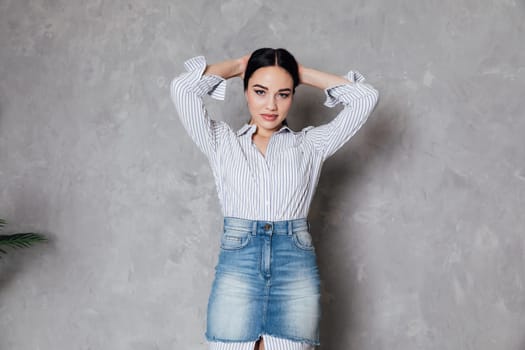 Portrait of beautiful young woman in home clothes