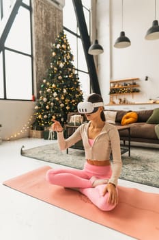 The stylish young lady engages in holiday activities with a virtual reality headset. High quality photo