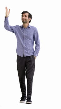 man in full growth. isolated on white background wearing headphones dancing.