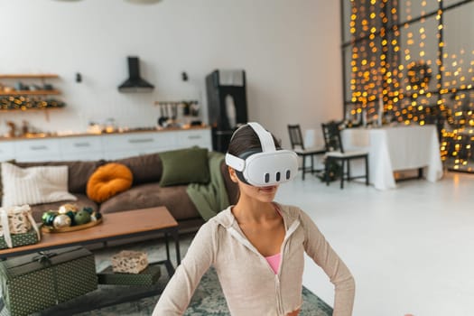 The young and beautiful woman recounts her feelings while donning a virtual reality headset. High quality photo