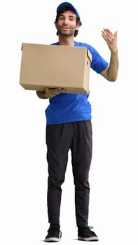 full-length male courier holding a box on a white background.