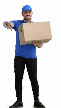 full-length male courier holding a box on a green background.