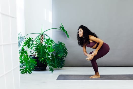 Female engaged in yoga fitness asana body flexibility