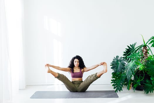 Female engaged in yoga fitness asana body flexibility