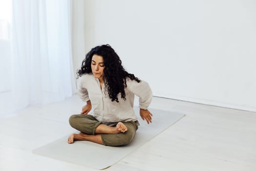 Female engaged in yoga asana gymnastics sport