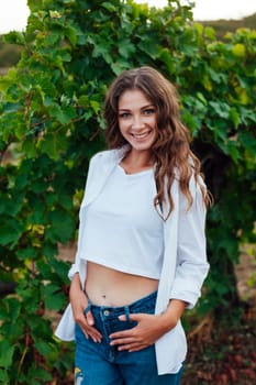 fashionable woman in the vineyards for wine