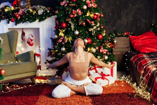 Christmas tree woman yoga asana gymnastics body new year