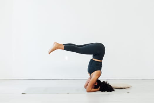 Flexible woman yoga asana gymnastics flexibility body fitness