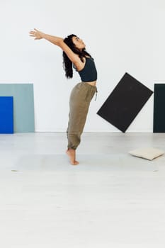 Beautiful flexible woman yoga asana gymnastics flexibility body fitness