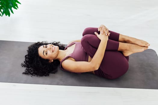 Beautiful woman yoga asana fitness gym