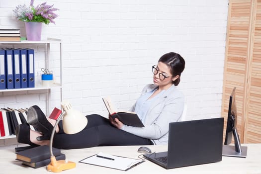 business girl works at a computer in the Office 1