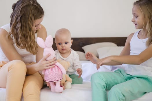 three sisters play children in the morning in the bedroom 3