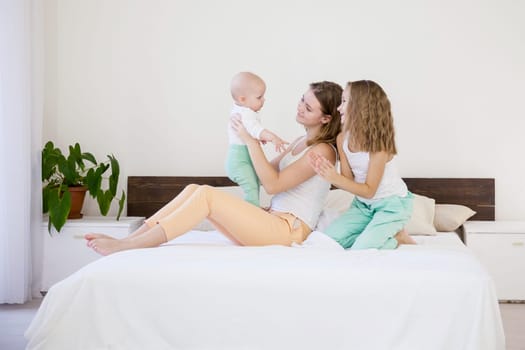 children of three sisters in the morning on the bed in the bedroom 1