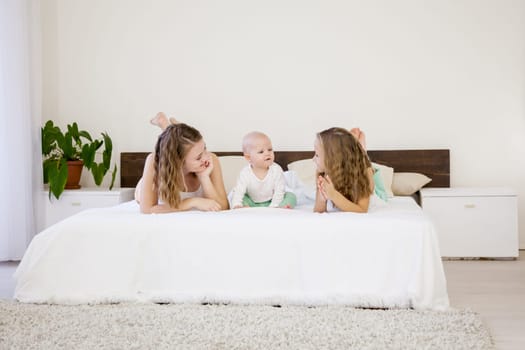 children of three sisters in the morning on the bed in the bedroom 1