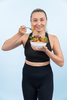 Happy smile senior woman portrait holding bowl of vegan fruit and vegetable on isolated background. Healthy senior people with healthy vegetarian nutrition and body care lifestyle. Clout