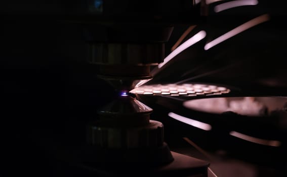 CNC laser cutting of metal and modern industrial technologies. Metal cutting machine and production