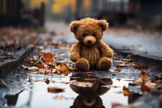 Conceptual image: loss childhood. Dirty teddy bear toy lies outdoors on the road as symbol of childrens loneliness. AI Generated