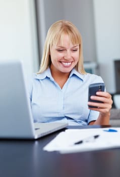 Business, woman and phone with typing or happy for text message, networking or internet chat in office. Entrepreneur, person and smartphone or smile with texting, communication and email at workplace.