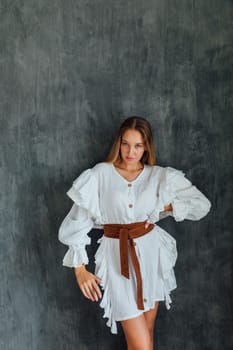 fashionable woman in white vintage western dress