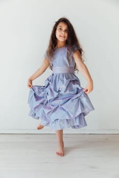 Beautiful girl 7 children in purple dress