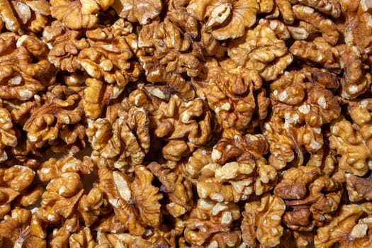 Scattered Shelled Walnuts. Background from Walnut. Natural High-Calorie Snacks