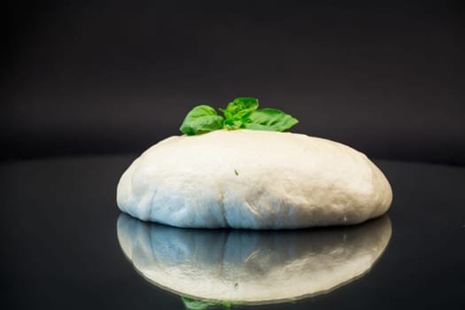 homemade yeast soft dough, isolated on black background
