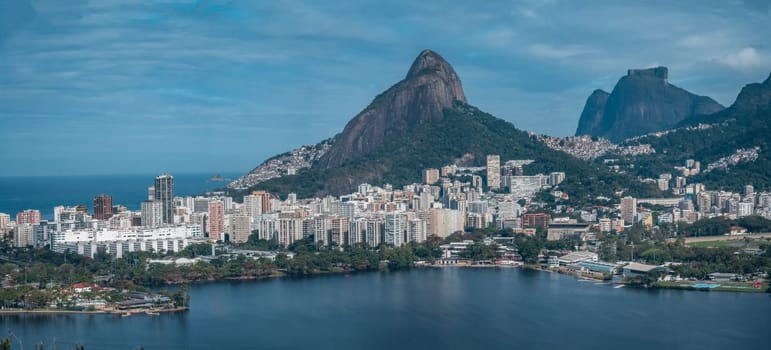 Rio de Janeiro's skyline boasts stunning views, blending luxury with poverty near a freshwater lagoon.