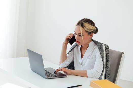Woman talking on the phone about work