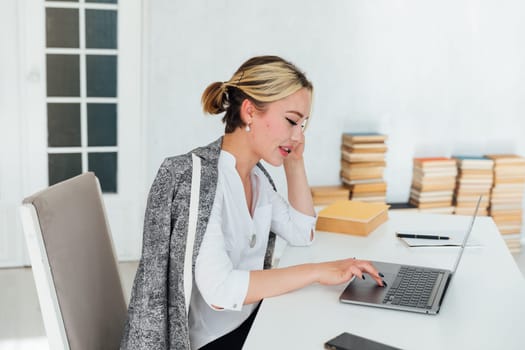 Woman talking on the phone about work